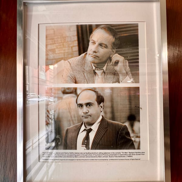 Framed black and white photos of Richard Dreyfuss and Danny DeVito from the movie "Tin Men".